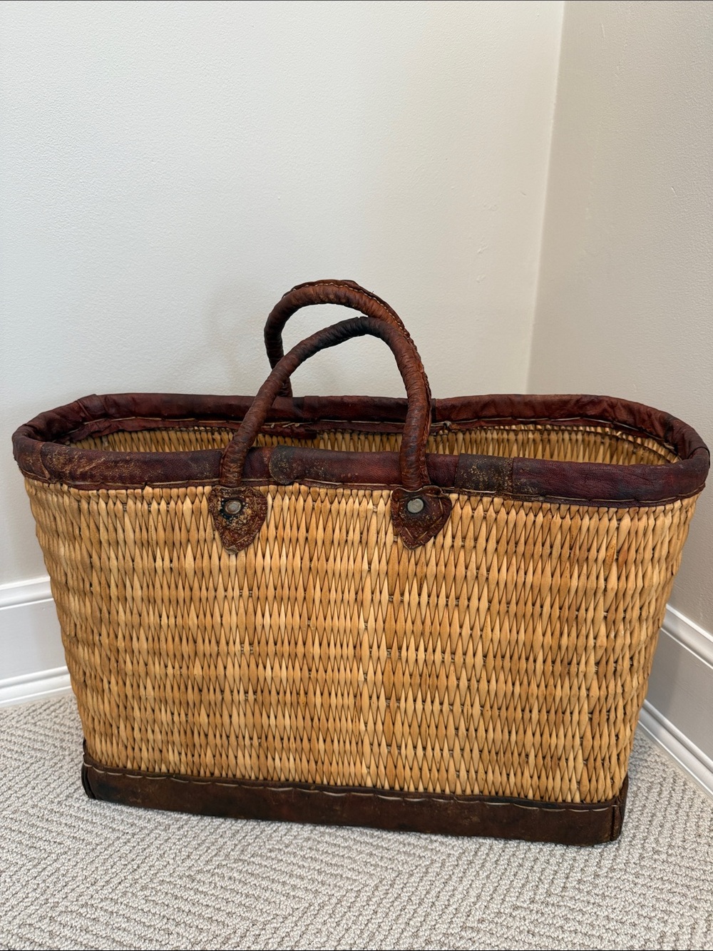 Natural Straw Tote Basket with Brown Leather Handles and Trim